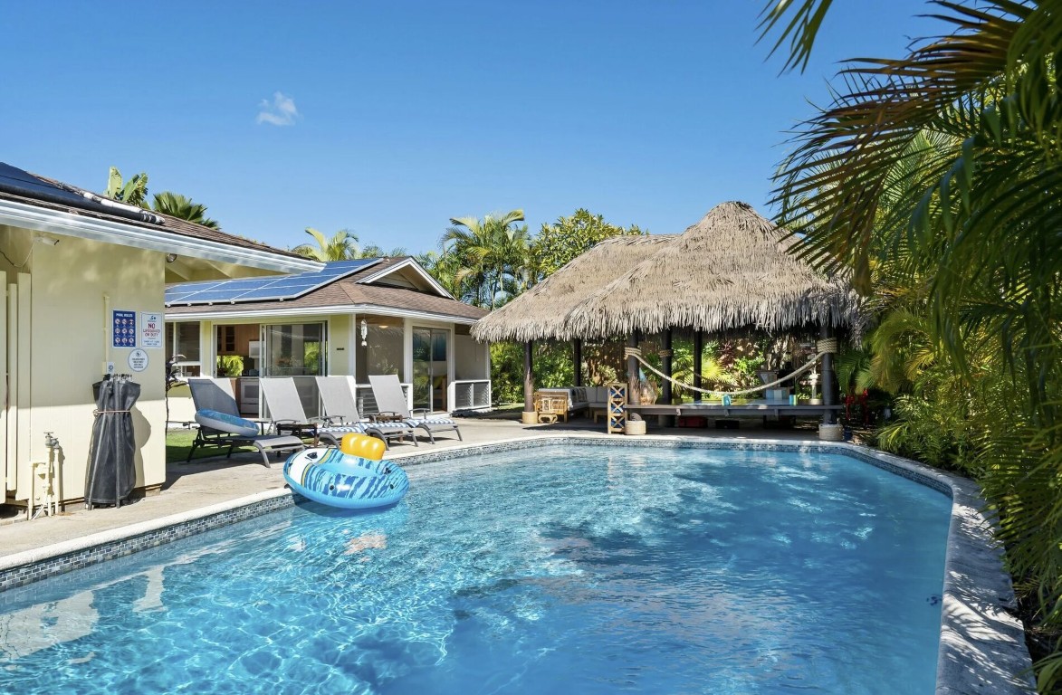 Beautiful tropical pool restored to crystal clear condition after green pool treatment in Princeton, TX